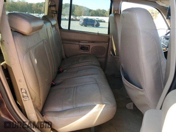 2000 Ford Explorer Eddie Bauer z VIN 1FMDU84P0YZB89831, wystawiony jako Copart lot #77874224 z przebiegiem 209 532 mil mil oraz Szkoda całkowita • Salvage title. Historia ofert i sprzedaży dostępna na DreamBid. Obrazek 11.