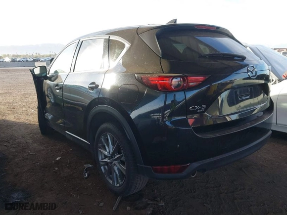 2021 Mazda CX-5 Grand Touring with VIN JM3KFBDM9M1395674, listed as a IAAI auction lot 41725822 with 1 mi miles. Bid and sale history available at carsss.com. Image 3.