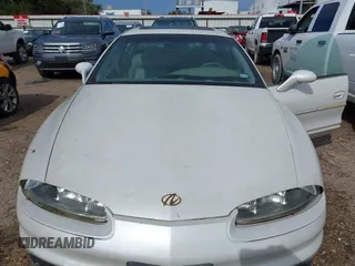 1996 Oldsmobile Aurora z VIN 1G3GR62C1T4121552, wystawiony jako IAAI lot #40766504 z przebiegiem 75 434 mil mil oraz . Historia ofert i sprzedaży dostępna na DreamBid. Obrazek 9.