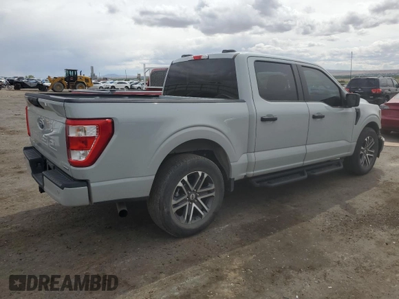 2023 Ford F-150 XL with VIN 1FTEW1CP2PFC13963, listed as a Copart auction lot 56045545 with 26,619 mi miles and Salvage title. Bid and sale history available at DreamBid. Image 3.