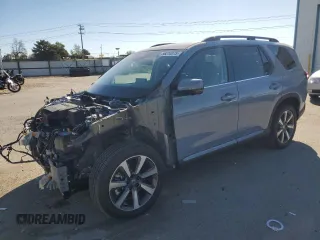 2025 Honda Pilot Elite z VIN 5FNYG1H82SB119445, wystawiony jako Copart lot #56210375 z przebiegiem 653 mil mil oraz Szkoda całkowita • Salvage title. Historia ofert i sprzedaży dostępna na DreamBid. Obrazek 1.