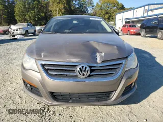 2010 Volkswagen CC Sport with VIN WVWMN7AN3AE541988, listed as a Copart auction lot 77670794 with 100,277 mi miles and Salvage Title. Bid and sale history available at DreamBid. Image 5.