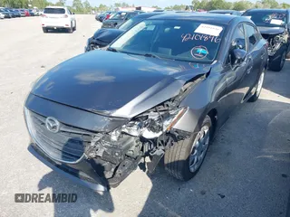 2016 Mazda 3 i Sport with VIN 3MZBM1T70GM305353, listed as a IAAI auction lot 42101846 with 103,791 mi miles and . Bid and sale history available at DreamBid. Image 6.
