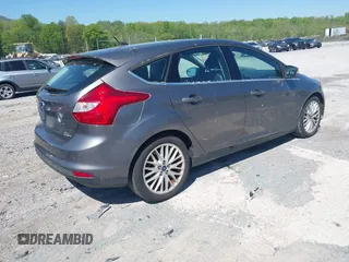 2012 Ford Focus SEL with VIN 1FAHP3M27CL399204, listed as a IAAI auction lot 41980976 with 113,443 mi miles. Bid and sale history available at carsss.com. Image 4.