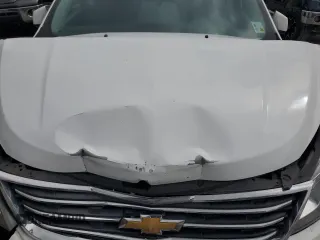 2016 Chevrolet Traverse LT z VIN 1GNKRHKDXGJ186560, wystawiony jako Copart lot #51823695 z przebiegiem 130 479 mil mil oraz Szkoda całkowita • Salvage title. Historia ofert i sprzedaży dostępna na DreamBid. Obrazek 12.