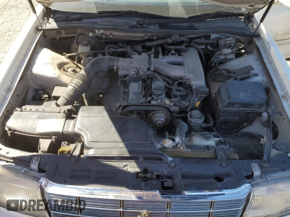 1996 Toyota Crown z VIN JZS1550042389, wystawiony jako Copart lot #68698234 z przebiegiem 117 283 mil mil oraz Szkoda całkowita • Salvage title. Historia ofert i sprzedaży dostępna na DreamBid. Obrazek 11.