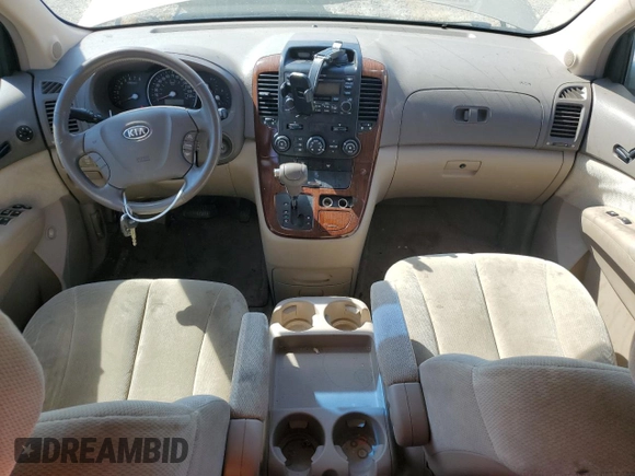 2006 Kia Sedona LX with VIN KNDMB233666035774, listed as a Copart auction lot 65491474 with 106,909 mi miles and Salvage Title. Bid and sale history available at carsss.com. Image 8.