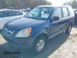2002 Honda CR-V LX with VIN JHLRD68422C007140, listed as a IAAI auction lot 41093756 with 184,588 mi miles and . Bid and sale history available at carsss.com. Image 17.