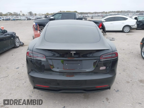 2022 Tesla Model S Plaid with VIN 5YJSA1E65NF484149, listed as a IAAI auction lot 40937538 with 11,459 mi miles and . Bid and sale history available at DreamBid. Image 15.