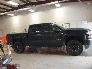 2017 Chevrolet Silverado 1500 LTZ with VIN 3GCUKSEC6HG300689, listed as a IAAI auction lot 41940491 with 165,998 mi miles. Bid and sale history available at carsss.com. Image 13.