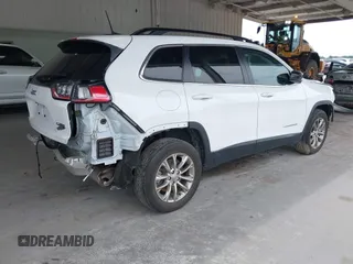 2022 Jeep Cherokee Latitude Lux z VIN 1C4PJLMXXND501689, wystawiony jako IAAI lot #42401720 z przebiegiem 34 037 mil mil oraz . Historia ofert i sprzedaży dostępna na DreamBid. Obrazek 4.