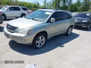2007 Lexus RX 350 with VIN 2T2HK31U77C026557, listed as a IAAI auction lot 42115027 with 184,827 mi miles. Bid and sale history available at carsss.com. Image 2.