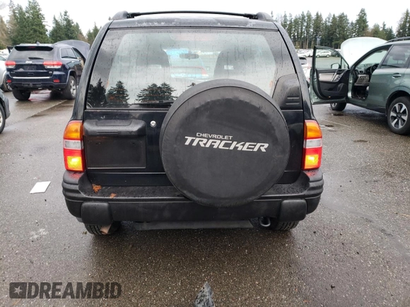 2003 Chevrolet Tracker ZR2 z VIN 2CNBJ734736946410, wystawiony jako Copart lot #82210474 z przebiegiem 61 414 mil mil oraz Szkoda całkowita • Salvage title. Historia ofert i sprzedaży dostępna na DreamBid. Obrazek 6.