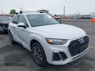 2022 Audi Q5 S line Premium Plus z VIN WA1EAAFYXN2075073, wystawiony jako IAAI lot #42444448 z przebiegiem 16 404 mil mil oraz . Historia ofert i sprzedaży dostępna na DreamBid. Obrazek 1.