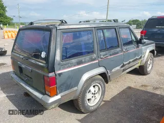 1991 Jeep Cherokee z VIN 1J4FJ58S6ML572036, wystawiony jako IAAI lot #42659999 z przebiegiem 200 845 mil mil oraz . Historia ofert i sprzedaży dostępna na DreamBid. Obrazek 4.