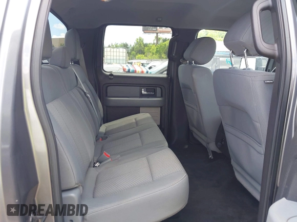 2013 Ford F-150 XL with VIN 1FTFW1CF8DKG49540, listed as a IAAI auction lot 42386031 with 151,073 mi miles and . Bid and sale history available at DreamBid. Image 8.