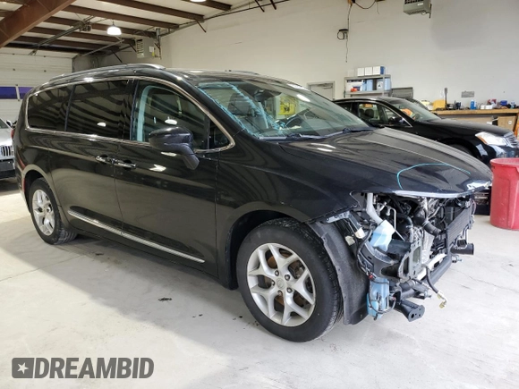 2017 Chrysler Pacifica Touring L with VIN 2C4RC1BG7HR608310, listed as a Copart auction lot 55654555 with 96,763 mi miles and Salvage Title. Bid and sale history available at DreamBid. Image 4.