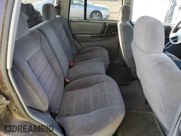 1997 Jeep Grand Cherokee Laredo with VIN 1J4GZ58S9VC687969, listed as a Copart auction lot 79930814 with 0 mi miles and Salvage Title. Bid and sale history available at carsss.com. Image 11.