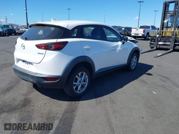 2021 Mazda CX-3 Sport with VIN JM1DKDB75M1500023, listed as a IAAI auction lot 41461424 with 65,162 mi miles. Bid and sale history available at carsss.com. Image 4.