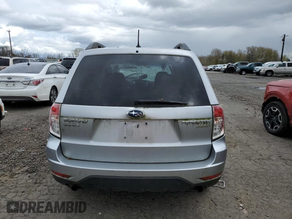 2012 Subaru Forester X Premium with VIN JF2SHADC2CH407983, listed as a Copart auction lot 51628125 with 147,271 mi miles and Salvage Title. Bid and sale history available at DreamBid. Image 6.