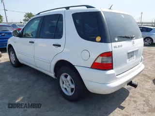 2001 Mercedes-Benz M 320/430/500 with VIN 4JGAB54E11A277233, listed as a IAAI auction lot 42519040 with 307,219 mi miles and . Bid and sale history available at DreamBid. Image 3.