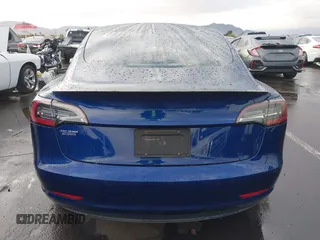 2022 Tesla Model 3 Performance with VIN 5YJ3E1EC7NF306192, listed as a IAAI auction lot 41453931 with 36,450 mi miles. Bid and sale history available at carsss.com. Image 15.