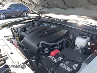 2023 Toyota Tacoma SR with VIN 3TMCZ5AN3PM590101, listed as a IAAI auction lot 42338670 with 12,970 mi miles and . Bid and sale history available at DreamBid. Image 10.
