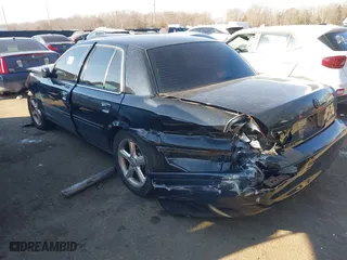 2003 Mercury Marauder with VIN 2MEHM75V23X626397, listed as a IAAI auction lot 41379235 with 326,372 mi miles. Bid and sale history available at carsss.com. Image 3.