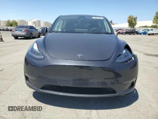 2024 Tesla Model Y Long Range с VIN 7SAYGDEE1RF060140, выставлен на аукционе Copart как лот 60923445 с пробегом 12 765 миль миль и Списание • Salvage title. История ставок и продаж доступна на DreamBid. Изображение 5.
