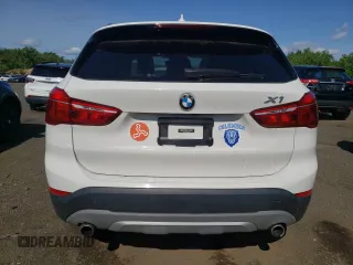 2018 BMW X1 xDrive28i z VIN WBXHT3C35J5F89977, wystawiony jako Copart lot #58464345 z przebiegiem 45 468 mil mil oraz Szkody całkowita. Historia ofert i sprzedaży dostępna na DreamBid. Obrazek 6.