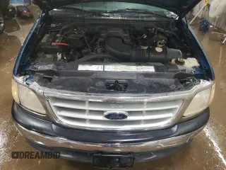 1999 Ford F-150 z VIN 1FTRF17W6XNB72620, wystawiony jako Copart lot #50977015 z przebiegiem Nie podano mil oraz Szkoda całkowita • Salvage title. Historia ofert i sprzedaży dostępna na DreamBid. Obrazek 11.