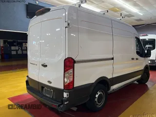 2021 Ford Transit Cargo with VIN 1FTYE1C87MKA94593, listed as a IAAI auction lot 42658954 with 99,425 mi miles and . Bid and sale history available at DreamBid. Image 17.