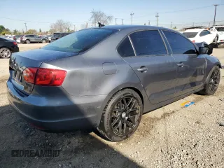 2013 Volkswagen Jetta Sedan SE with VIN 3VWDP7AJ4DM427114, listed as a Copart auction lot 52038615 with 186,429 mi miles and Salvage Title. Bid and sale history available at carsss.com. Image 3.