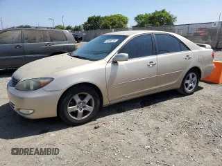 2002 Toyota Camry LE z VIN JTDBE32K520023383, wystawiony jako Copart lot #59396755 z przebiegiem 239 673 mil mil oraz Czysty tytuł • Clean title. Historia ofert i sprzedaży dostępna na DreamBid. Obrazek 1.