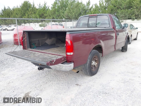 1999 Ford F-150 with VIN 2FTZF1722XCA69178, listed as a IAAI auction lot 42313254 with 197,589 mi miles and . Bid and sale history available at DreamBid. Image 4.