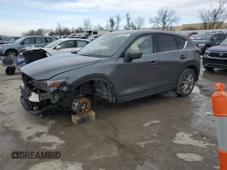 2021 Mazda CX-5 Grand Touring with VIN JM3KFBDM9M0452011, listed as a Copart auction lot 46230945 with 54,825 mi miles and Salvage Title. Bid and sale history available at carsss.com. Image 1.