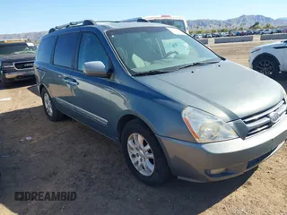 2006 Kia Sedona LX with VIN KNDMB233866096107, listed as a IAAI auction lot 41876430 with 148,634 mi miles. Bid and sale history available at carsss.com. Image 1.