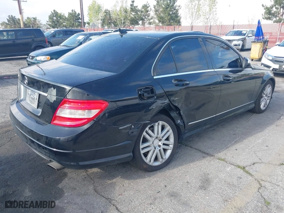 2009 Mercedes-Benz C-Class 3.0L Sport with VIN WDDGF54X19R061356, listed as a IAAI auction lot 41910107 with 300,926 mi miles. Bid and sale history available at carsss.com. Image 4.
