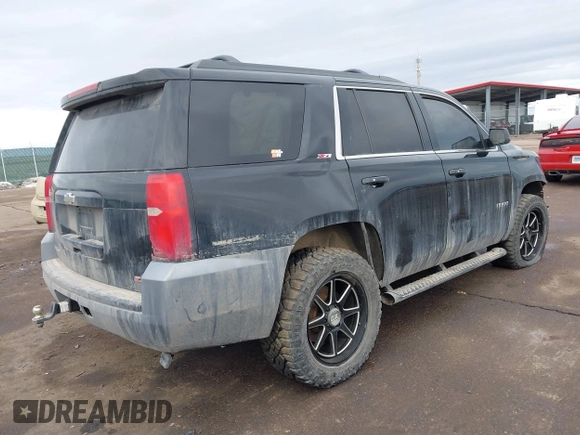 2017 Chevrolet Tahoe LT with VIN 1GNSKBKC7HR178685, listed as a IAAI auction lot 41466840 with 163,610 mi miles and . Bid and sale history available at DreamBid. Image 4.