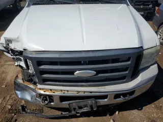 2007 Ford F-250 XL z VIN 1FTNF20517EA27507, wystawiony jako Copart lot #49907075 z przebiegiem 298 441 mil mil oraz Czysty tytuł • Clean title. Historia ofert i sprzedaży dostępna na DreamBid. Obrazek 11.