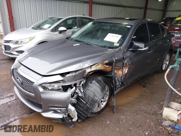 2015 Infiniti Q50 Premium z VIN JN1BV7ARXFM411040, wystawiony jako IAAI lot #41706295 z przebiegiem 97 297 mil mil oraz . Historia ofert i sprzedaży dostępna na DreamBid. Obrazek 17.