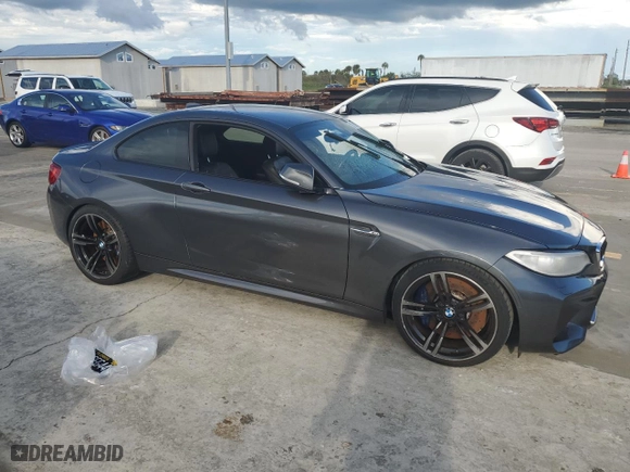 2016 BMW M2 with VIN WBS1H9C52GV786091, listed as a Copart auction lot 73875914 with 0 mi miles and Salvage Title. Bid and sale history available at carsss.com. Image 4.