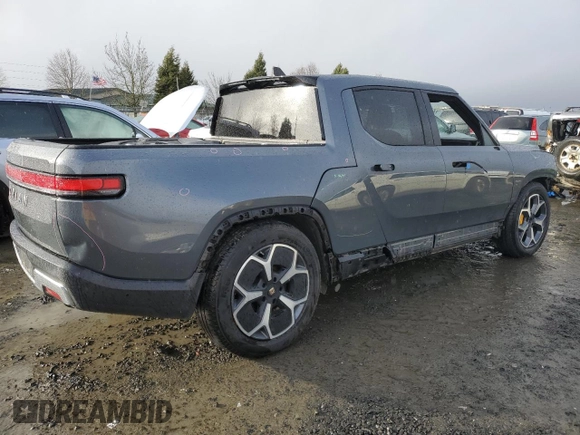 2022 Rivian R1T Adventure z VIN 7FCTGAAA5NN014941, wystawiony jako Copart lot #43771755 z przebiegiem 43 410 mil mil oraz Szkody całkowita. Historia ofert i sprzedaży dostępna na DreamBid. Obrazek 3.