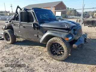 2019 Jeep Wrangler Unlimited Sport S z VIN 1C4HJXDGXKW500313, wystawiony jako IAAI lot #41022680 z przebiegiem 82 864 mil mil oraz . Historia ofert i sprzedaży dostępna na DreamBid. Obrazek 1.
