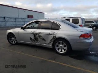 2006 BMW 7 Series 750i with VIN WBAHL83586DT05258, listed as a Copart auction lot 77033744 with 129,376 mi miles and Salvage Title. Bid and sale history available at carsss.com. Image 2.