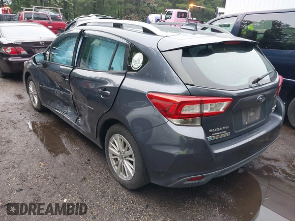 2017 Subaru Impreza Premium with VIN 4S3GTAB68H3712411, listed as a IAAI auction lot 42503350 with 206,967 mi miles and . Bid and sale history available at DreamBid. Image 3.
