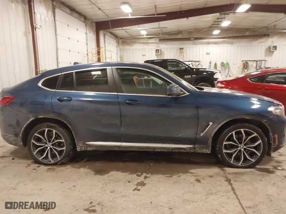2023 BMW X4 xDrive30i with VIN 5UX33DT01P9R31277, listed as a IAAI auction lot 41618617 with 23,952 mi miles. Bid and sale history available at carsss.com. Image 13.