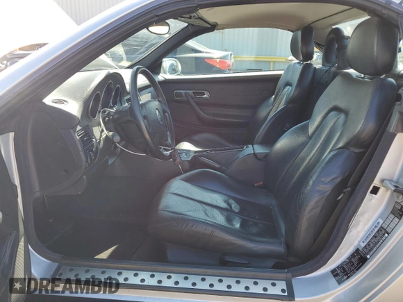 1998 Mercedes-Benz SLK 230/320 with VIN WDBKK47F9WF057337, listed as a Copart auction lot 65023905 with 243,917 mi miles and Salvage title. Bid and sale history available at DreamBid. Image 7.