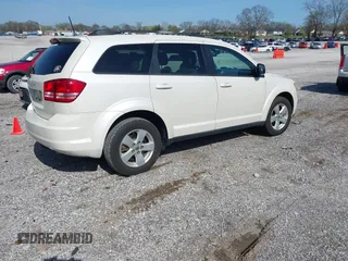 2018 Dodge Journey SE z VIN 3C4PDCAB9JT444292, wystawiony jako IAAI lot #41902314 z przebiegiem 90 538 mil mil oraz . Historia ofert i sprzedaży dostępna na DreamBid. Obrazek 4.