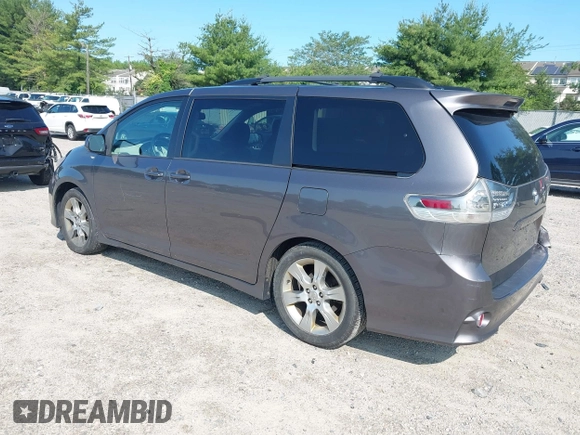 2012 Toyota Sienna SE with VIN 5TDXK3DCXCS267405, listed as a IAAI auction lot 42401101 with 134,553 mi miles and . Bid and sale history available at DreamBid. Image 3.